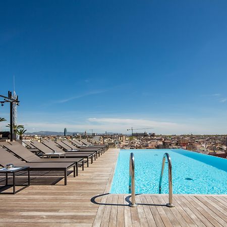 Grand Hotel Central, Small Luxury Hotels Barcellona Esterno foto Rooftop pool at Hotel W Barcelona